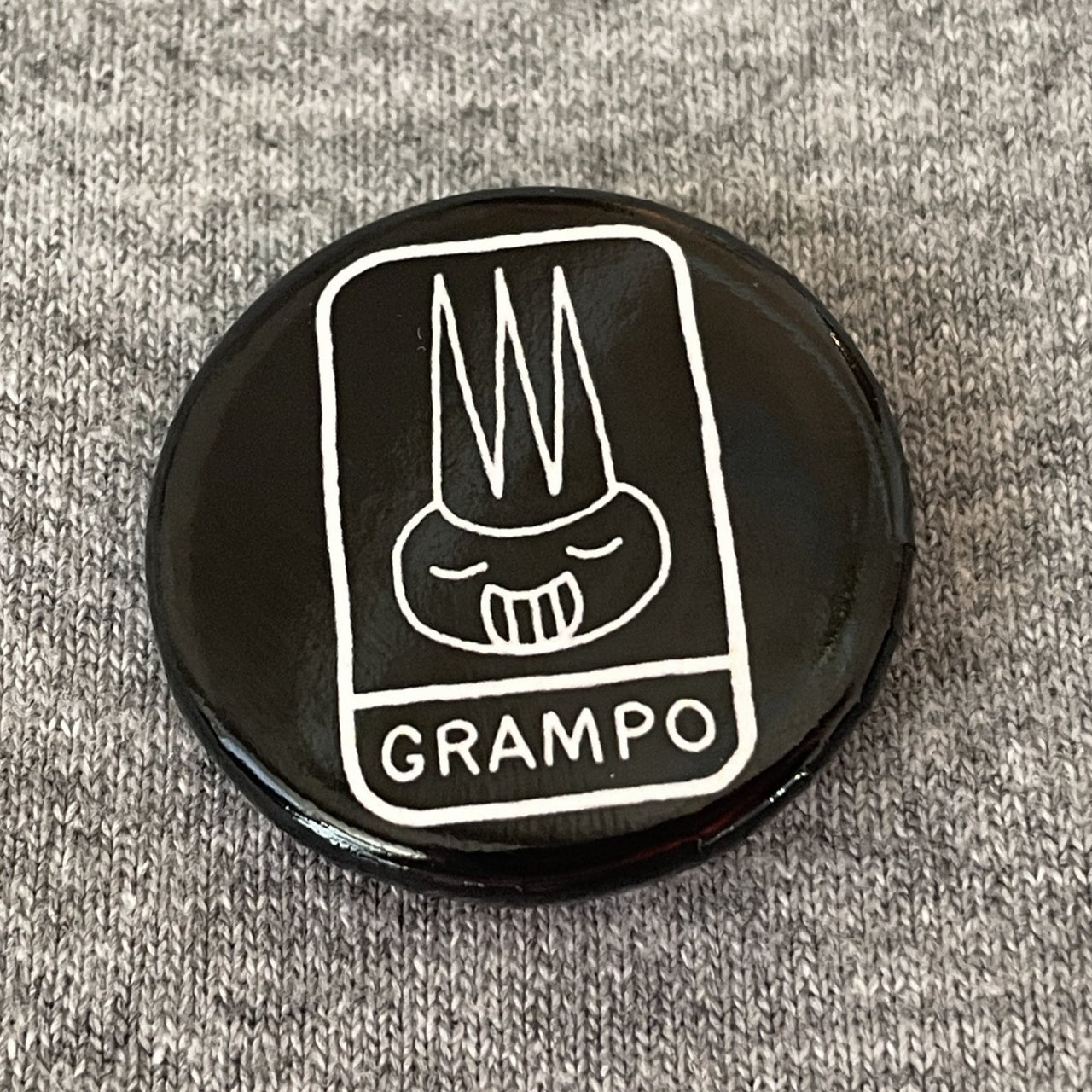 Grampo button